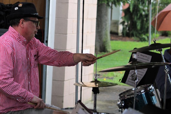 A drummer playing the drumset.